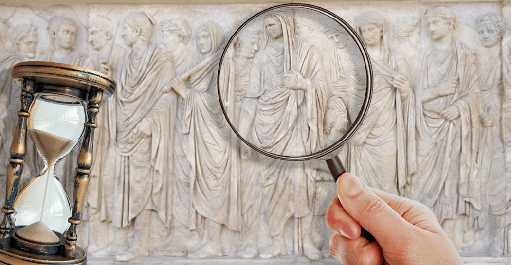clessidra e lente di ingrandimento su rilievo dell'Ara Pacis