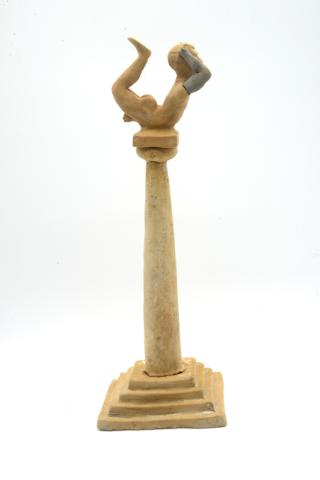 11.	Figurina maschile di acrobata su colonna Taranto, Museo Archeologico Nazionale di Taranto